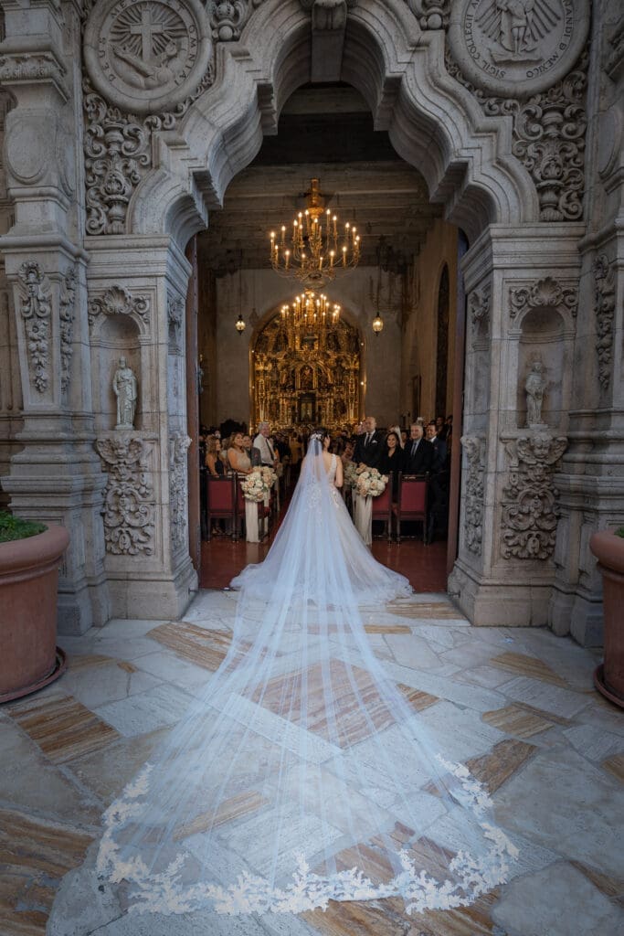 Amila and Kelly ceremony inside St. Francis Chapel at Mission Inn Hotel