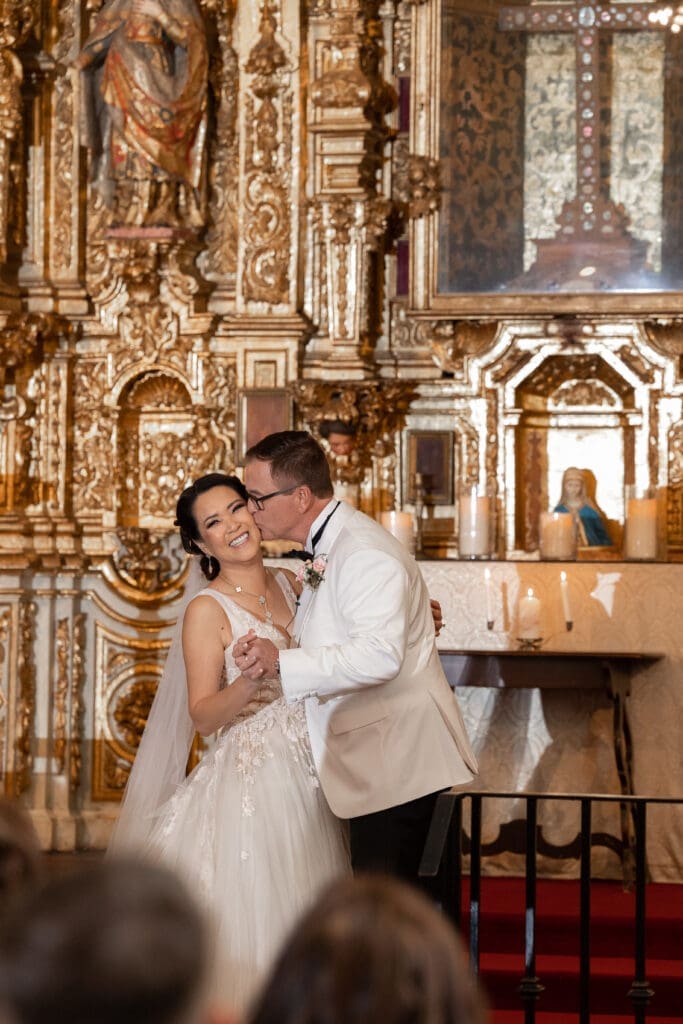 Amila and Kelly ceremony inside St. Francis Chapel at Mission Inn Hotel