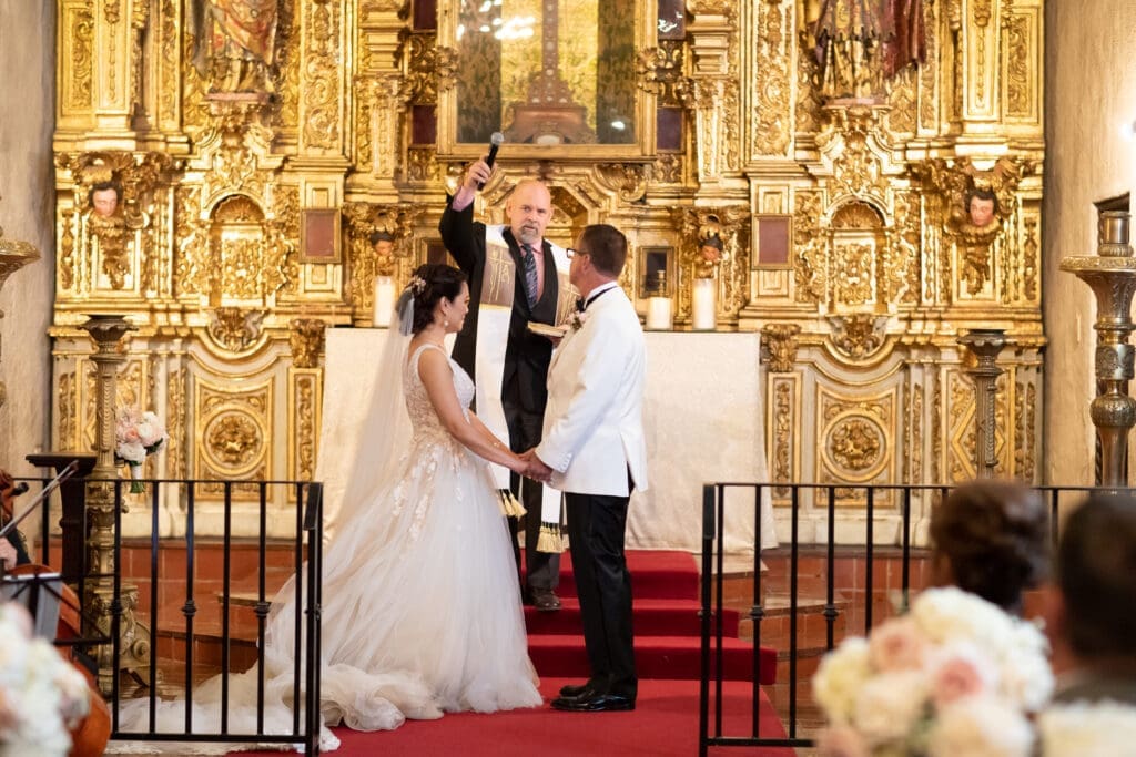 Amila and Kelly ceremony inside St. Francis Chapel at Mission Inn Hotel