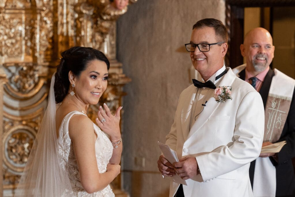 Amila and Kelly ceremony inside St. Francis Chapel at Mission Inn Hotel